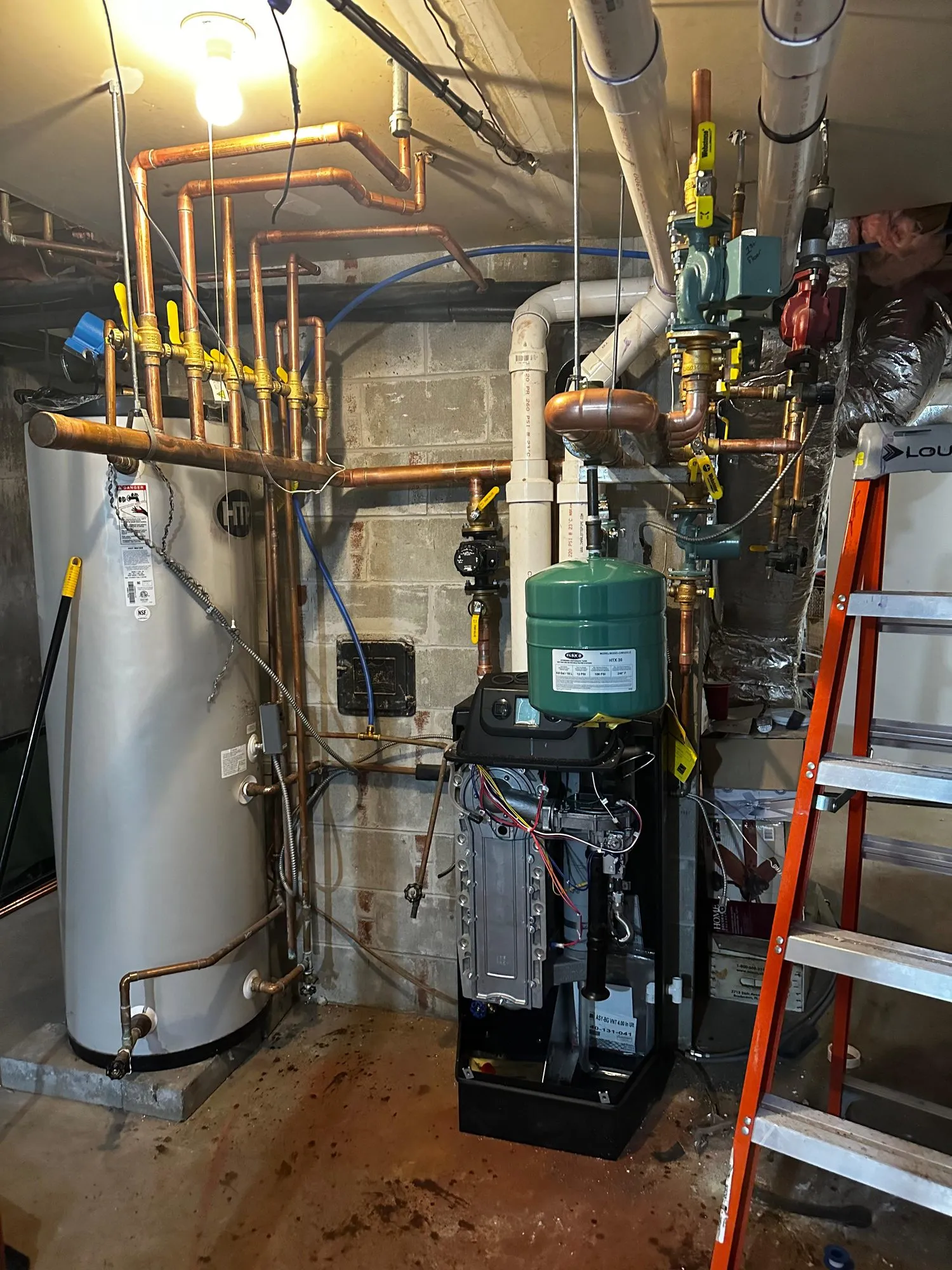 Boiler with an indirect water heater, expansion tank and copper header