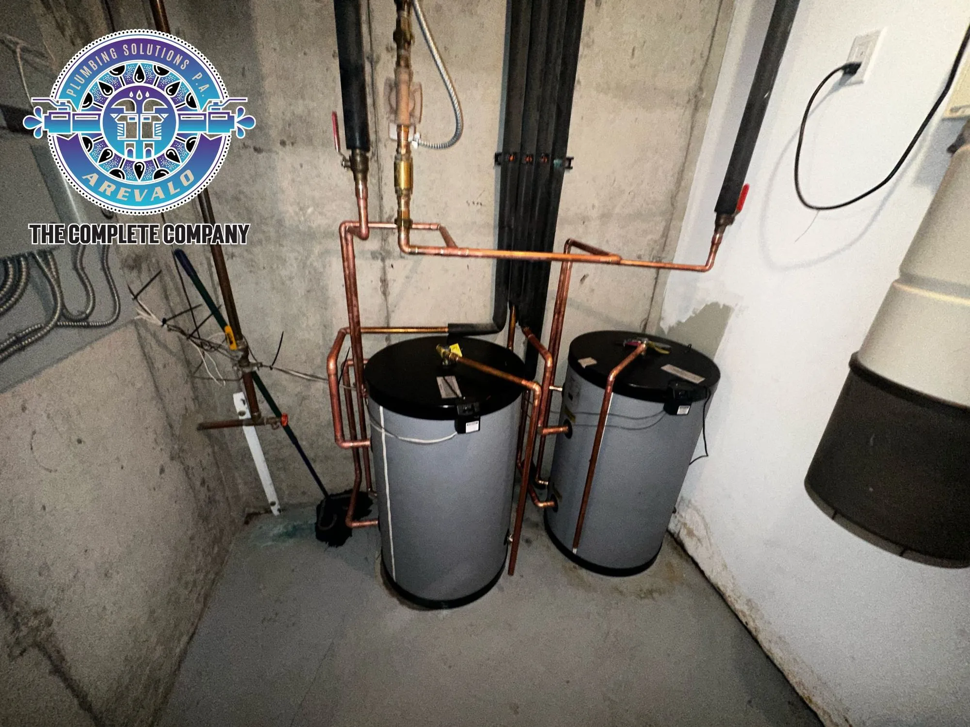Two indirect hot water storage tanks piped in copper