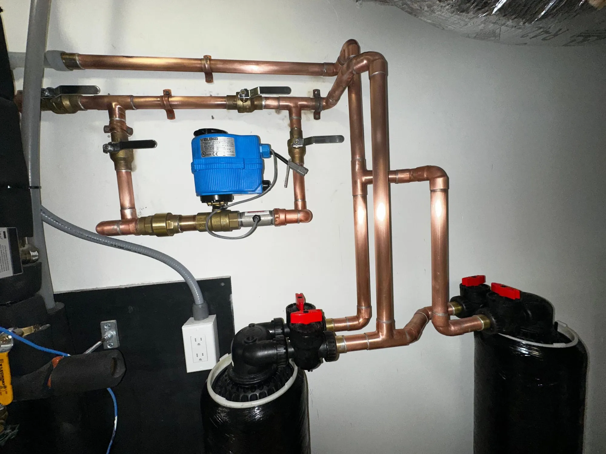 Copper bypass manifold piped above whole-house water filtration tanks